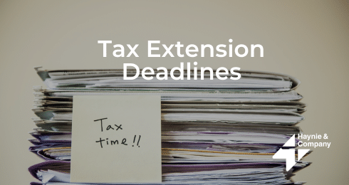 Tax documents stack with Tax time!! note, Haynie logo, and Tax Extension Deadlines text.