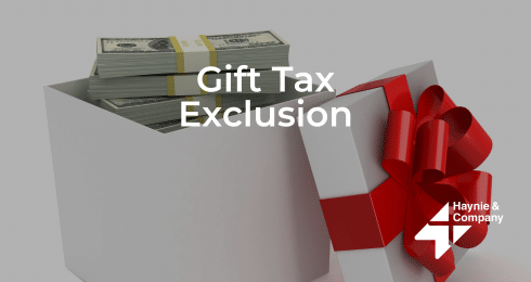 Gift box with cash and text Gift Tax Exclusion, Haynie logo displayed.
