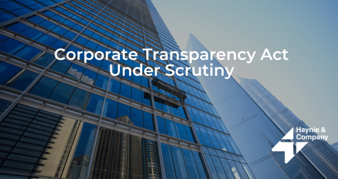 Corporate Transparency Act discussed; skyscraper with Haynie logo in view.