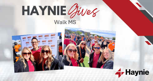 Group photo at Haynie Gives Walk MS event with participants wearing sunglasses and smiling.
