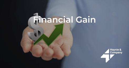 Hand holding dollar symbol with upward arrow, text Financial Gain, Haynie logo.