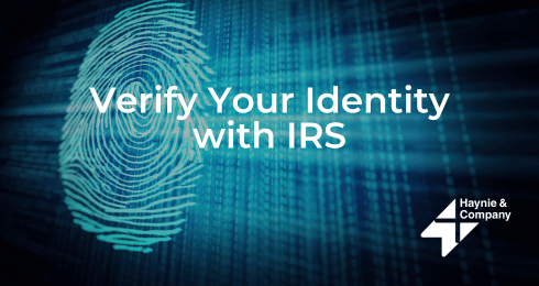 Fingerprint and “Verify Your Identity with IRS” text on a digital background, Haynie logo.