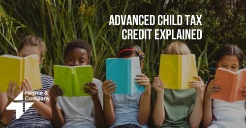Children sitting in a row, reading colorful books, with text Advanced Child Tax Credit Explained.