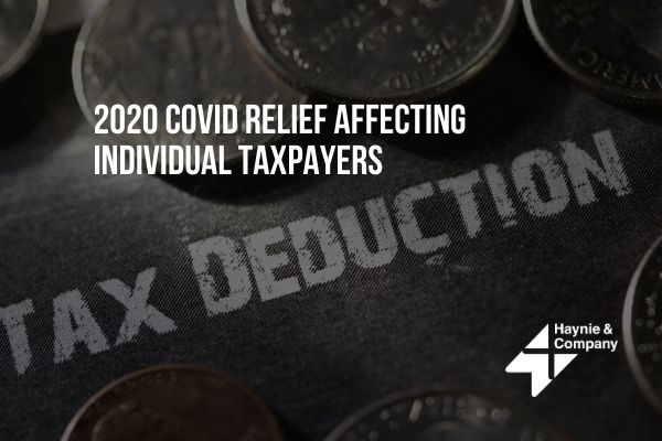 2020 Covid relief impact on taxpayers with tax deduction text and coins in background.