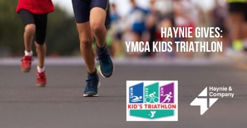Children running in YMCA Kids Triathlon sponsored by Haynie.