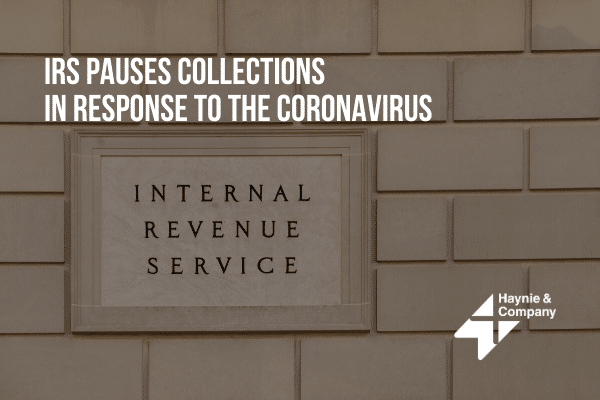 IRS pauses collections due to coronavirus, Internal Revenue Service sign on stone wall, Haynie logo.