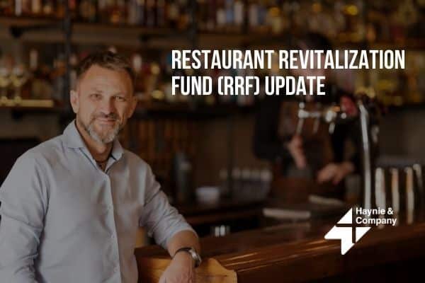 Restaurant owner in a bar setting discussing Restaurant Revitalization Fund (RRF) update.
