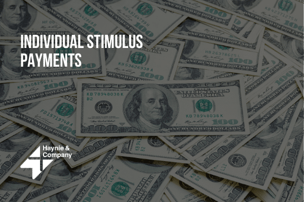 Stack of US dollar bills with Individual Stimulus Payments and Haynie logo.