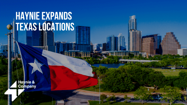 Texas flag and city skyline with Haynie Expands Texas Locations text.